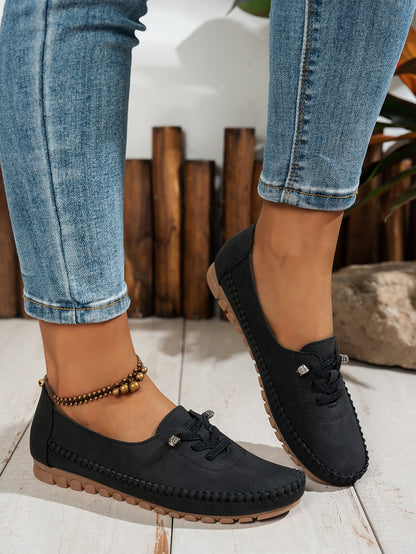 Black women's soft loafers worn view