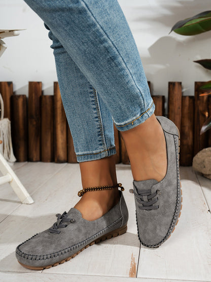 Gray women's soft loafers worn view