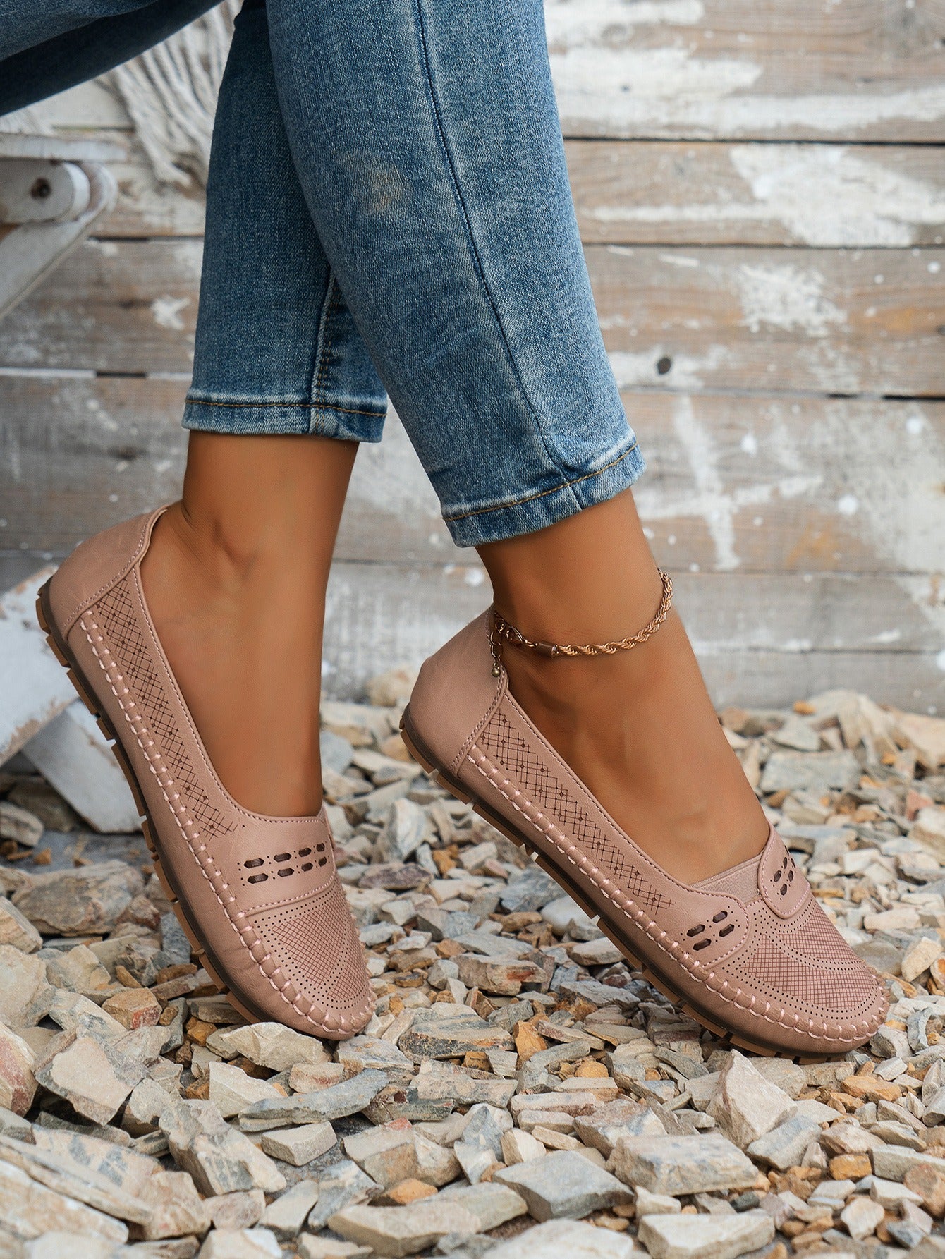 Pink women's stitched laser-cut flat loafers