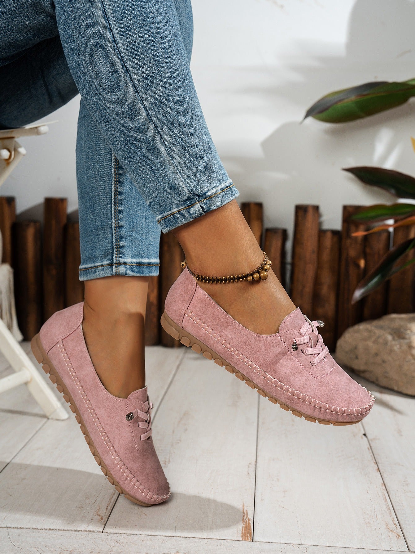 Pink women's soft loafers worn view