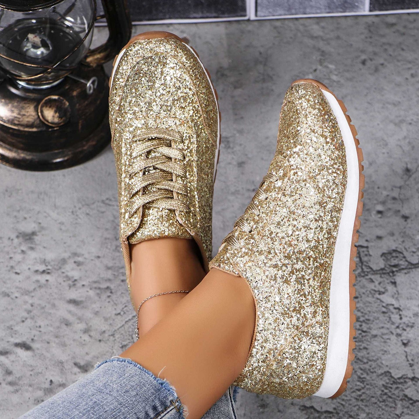 Gold sequin lace-up sneakers top view