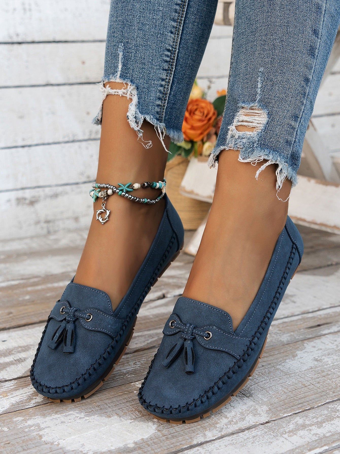 Women's blue tassel moccasin flat loafers lifestyle view