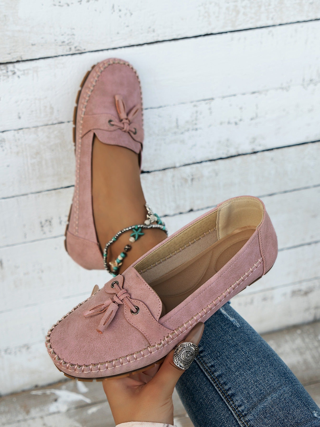 Women's pink tassel loafers side view